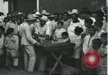 Image of Brazilian natives at market Brazil, 1932, second 40 stock footage video 65675064724