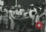 Image of Brazilian natives at market Brazil, 1932, second 42 stock footage video 65675064724