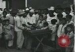 Image of Brazilian natives at market Brazil, 1932, second 44 stock footage video 65675064724