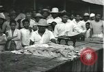 Image of Brazilian natives at market Brazil, 1932, second 48 stock footage video 65675064724