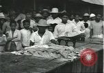 Image of Brazilian natives at market Brazil, 1932, second 49 stock footage video 65675064724