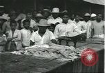Image of Brazilian natives at market Brazil, 1932, second 50 stock footage video 65675064724
