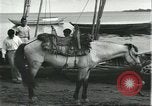 Image of Brazilian natives at market Brazil, 1932, second 58 stock footage video 65675064724