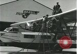 Image of Mechanics work on Consolidated Commodore flying boat Brazil, 1932, second 4 stock footage video 65675064725
