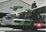 Image of Mechanics work on Consolidated Commodore flying boat Brazil, 1932, second 6 stock footage video 65675064725