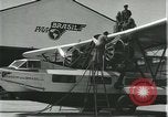 Image of Mechanics work on Consolidated Commodore flying boat Brazil, 1932, second 7 stock footage video 65675064725