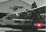 Image of Mechanics work on Consolidated Commodore flying boat Brazil, 1932, second 10 stock footage video 65675064725