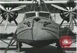Image of Mechanics work on Consolidated Commodore flying boat Brazil, 1932, second 12 stock footage video 65675064725
