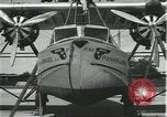 Image of Mechanics work on Consolidated Commodore flying boat Brazil, 1932, second 14 stock footage video 65675064725