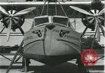 Image of Mechanics work on Consolidated Commodore flying boat Brazil, 1932, second 16 stock footage video 65675064725