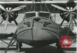 Image of Mechanics work on Consolidated Commodore flying boat Brazil, 1932, second 18 stock footage video 65675064725