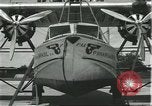 Image of Mechanics work on Consolidated Commodore flying boat Brazil, 1932, second 20 stock footage video 65675064725