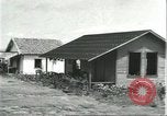 Standbild Arbeiter Dorf für Fordlandia Brasilien, 1932, aus Sekunde 24 historischem Filmmaterial Videoclip 65675064729
