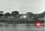 Standbild Dorf in Brasilien vom Fluss aus gesehen Brasilien, 1932, aus Sekunde 5 historischem Filmmaterial Videoclip 65675064730
