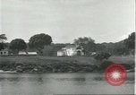 Standbild Dorf in Brasilien vom Fluss aus gesehen Brasilien, 1932, aus Sekunde 7 historischem Filmmaterial Videoclip 65675064730