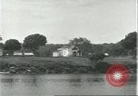 Standbild Dorf in Brasilien vom Fluss aus gesehen Brasilien, 1932, aus Sekunde 9 historischem Filmmaterial Videoclip 65675064730