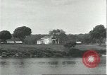 Standbild Dorf in Brasilien vom Fluss aus gesehen Brasilien, 1932, aus Sekunde 11 historischem Filmmaterial Videoclip 65675064730