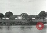 Standbild Dorf in Brasilien vom Fluss aus gesehen Brasilien, 1932, aus Sekunde 12 historischem Filmmaterial Videoclip 65675064730