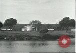 Standbild Dorf in Brasilien vom Fluss aus gesehen Brasilien, 1932, aus Sekunde 14 historischem Filmmaterial Videoclip 65675064730