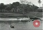 Standbild Dorf in Brasilien vom Fluss aus gesehen Brasilien, 1932, aus Sekunde 20 historischem Filmmaterial Videoclip 65675064730