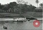 Standbild Dorf in Brasilien vom Fluss aus gesehen Brasilien, 1932, aus Sekunde 23 historischem Filmmaterial Videoclip 65675064730