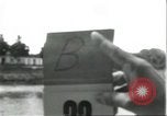 Standbild Dorf in Brasilien vom Fluss aus gesehen Brasilien, 1932, aus Sekunde 25 historischem Filmmaterial Videoclip 65675064730