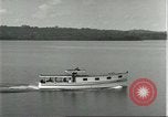 Standbild Dorf in Brasilien vom Fluss aus gesehen Brasilien, 1932, aus Sekunde 30 historischem Filmmaterial Videoclip 65675064730