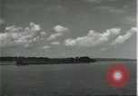 Standbild Dorf in Brasilien vom Fluss aus gesehen Brasilien, 1932, aus Sekunde 38 historischem Filmmaterial Videoclip 65675064730