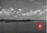 Standbild Dorf in Brasilien vom Fluss aus gesehen Brasilien, 1932, aus Sekunde 39 historischem Filmmaterial Videoclip 65675064730