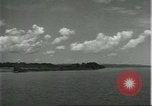 Standbild Dorf in Brasilien vom Fluss aus gesehen Brasilien, 1932, aus Sekunde 42 historischem Filmmaterial Videoclip 65675064730