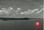 Standbild Dorf in Brasilien vom Fluss aus gesehen Brasilien, 1932, aus Sekunde 43 historischem Filmmaterial Videoclip 65675064730