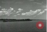 Standbild Dorf in Brasilien vom Fluss aus gesehen Brasilien, 1932, aus Sekunde 44 historischem Filmmaterial Videoclip 65675064730