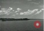 Standbild Dorf in Brasilien vom Fluss aus gesehen Brasilien, 1932, aus Sekunde 46 historischem Filmmaterial Videoclip 65675064730