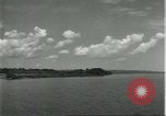 Standbild Dorf in Brasilien vom Fluss aus gesehen Brasilien, 1932, aus Sekunde 47 historischem Filmmaterial Videoclip 65675064730