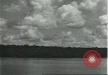 Standbild Dorf in Brasilien vom Fluss aus gesehen Brasilien, 1932, aus Sekunde 57 historischem Filmmaterial Videoclip 65675064730