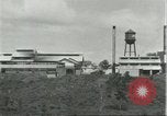 Image of Fordlandia power plant and warehouses Brazil, 1932, second 22 stock footage video 65675064734