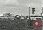 Image of Fordlandia power plant and warehouses Brazil, 1932, second 24 stock footage video 65675064734