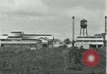 Image of Fordlandia power plant and warehouses Brazil, 1932, second 25 stock footage video 65675064734