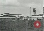 Image of Fordlandia power plant and warehouses Brazil, 1932, second 27 stock footage video 65675064734