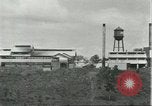 Image of Fordlandia power plant and warehouses Brazil, 1932, second 30 stock footage video 65675064734