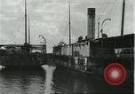 Image of rusted boats Brazil, 1931, second 15 stock footage video 65675064739