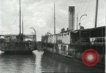 Image of rusted boats Brazil, 1931, second 16 stock footage video 65675064739
