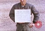 Image of airman backwards on rocket sled New Mexico United States USA, 1958, second 4 stock footage video 65675064987