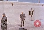 Image of airmen on rocket sled New Mexico United States USA, 1958, second 8 stock footage video 65675064999