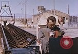 Image of airmen on rocket sled New Mexico United States USA, 1958, second 33 stock footage video 65675064999
