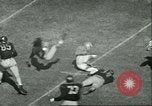 Image of Texas versus Purdue college football Indiana United States USA, 1951, second 16 stock footage video 65675065083