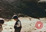 Image of Marines at Korean War orphanage Korea, 1950, second 37 stock footage video 65675065190