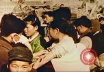 Image of Marines at Korean War orphanage Korea, 1950, second 52 stock footage video 65675065190