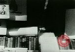 Immagine di Outdoor display di dipinti e libri Parigi Francia, 1928, secondo 5 filmato di repertorio 65675065234