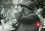 Image of Sidewalk cafe on Champs-Elysees Paris France, 1928, second 4 stock footage video 65675065235